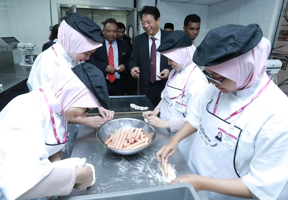 AEON baking school students in the new kitchen facility