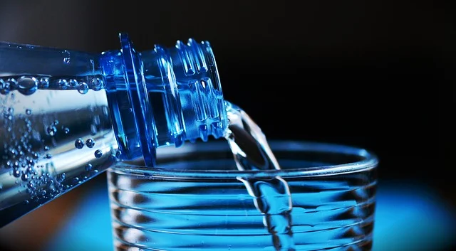 Drinking water from a glass