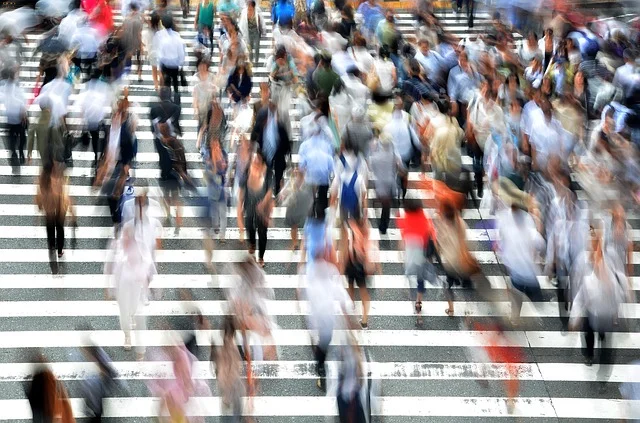 Pedestrians walking on zebra crossing