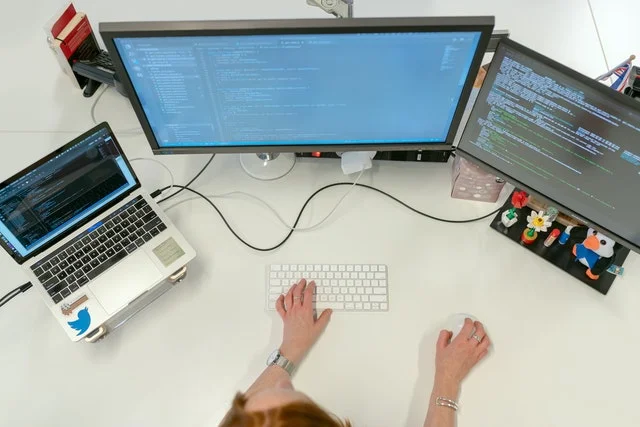 Female software engineer working on a programme.